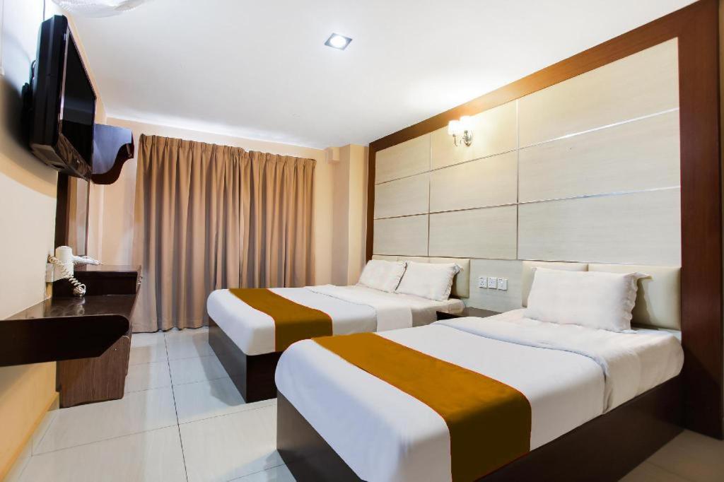 Sejati Hotel 实兆远 外观 照片